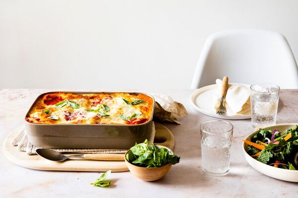 Table set with a variety of simple dishes and salad